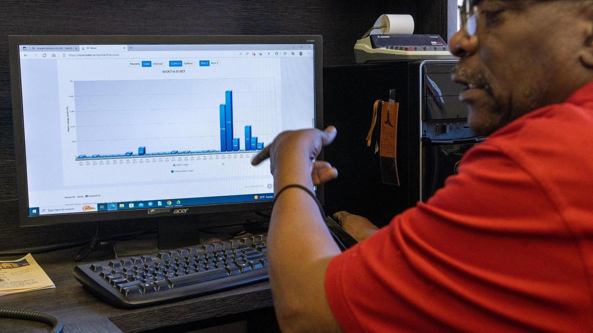 Ronald Carter shows a graph of the water usage readings at Linwood United Church on Friday, Feb. 10, 2023, in Kansas City. Carter hired inspectors to confirm that there are no leaks in the building.