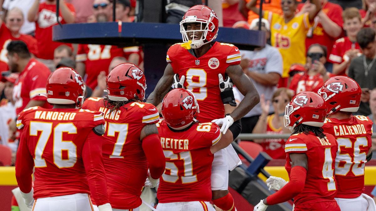 Chiefs wide receiver Justyn Ross (8) celebrates a touchdown reception with center Austin Reiter (61) during a preseason game against the Cleveland Browns on Saturday, Aug. 26, 2023, in Kansas City.