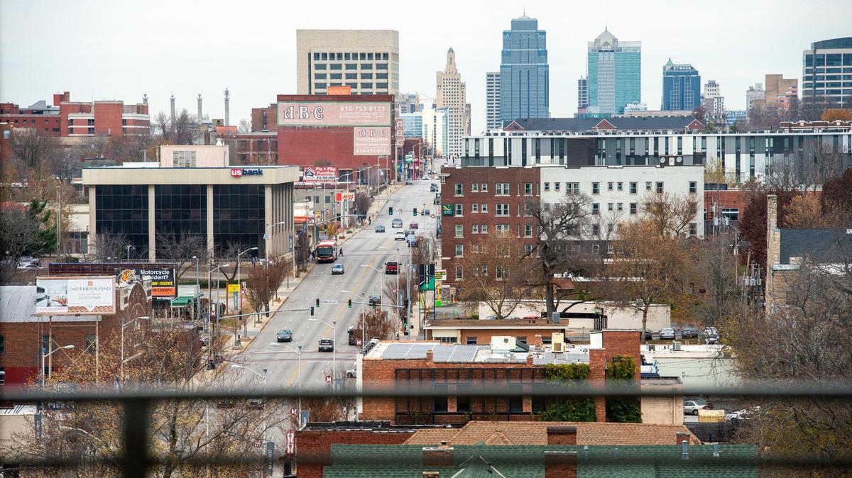 A high-end two-bedroom loft at the Monarch Apartments with a view of downtown Kansas City in the distance.
