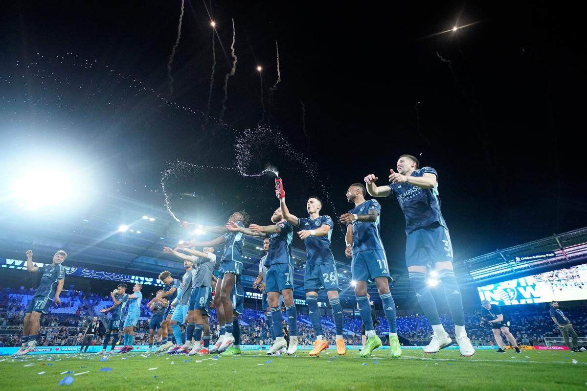 Sporting Kansas City players celebrate after defeating the Seattle Sounders at Children’s Mercy Park on June 8, 2024.