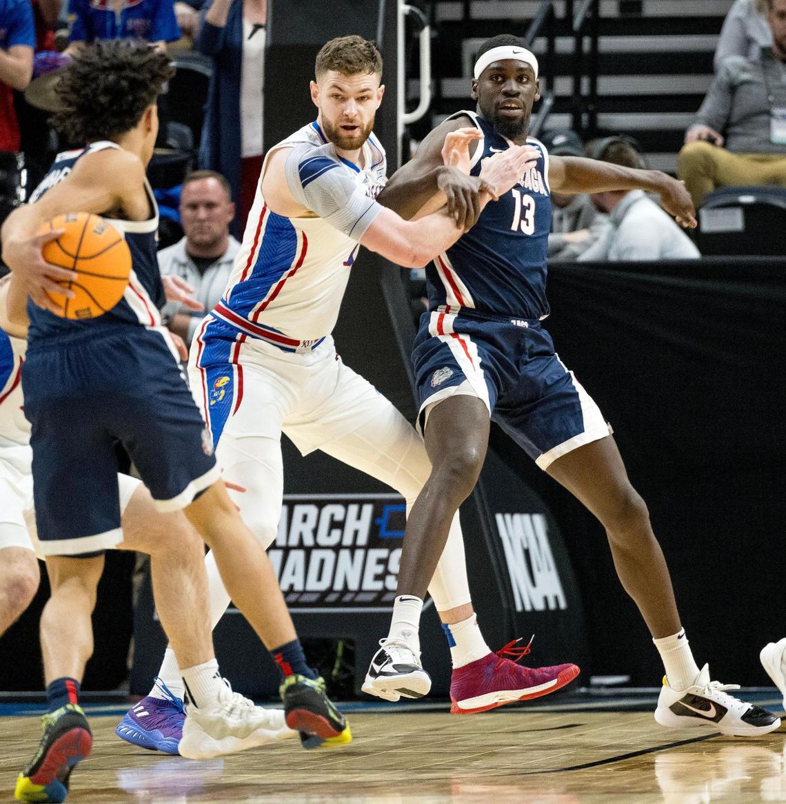 Kansas Jayhawks center Hunter Dickinson (1) and Gonzaga Bulldogs forward Graham Ike (13) battle for position in the paint during a men’s college basketball game in the second round of the NCAA Tournament on Saturday, March 23, 2024, in Salt Lake City, Utah.