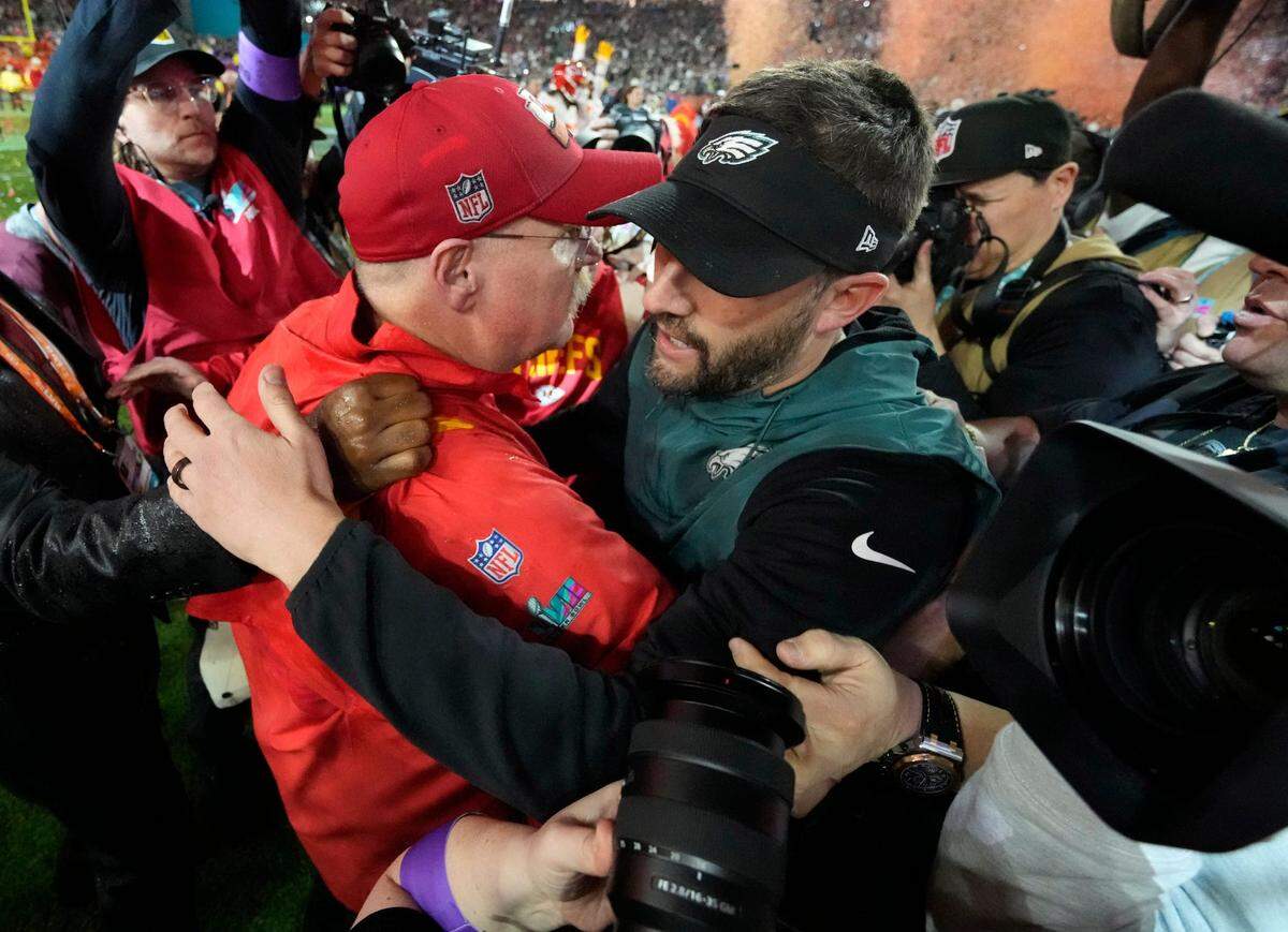Kansas City Chiefs head coach Andy Reid and Philadelphia Eagles head coach Nick Sirianni greet each other after Super Bowl LVII at State Farm Stadium in 2023.