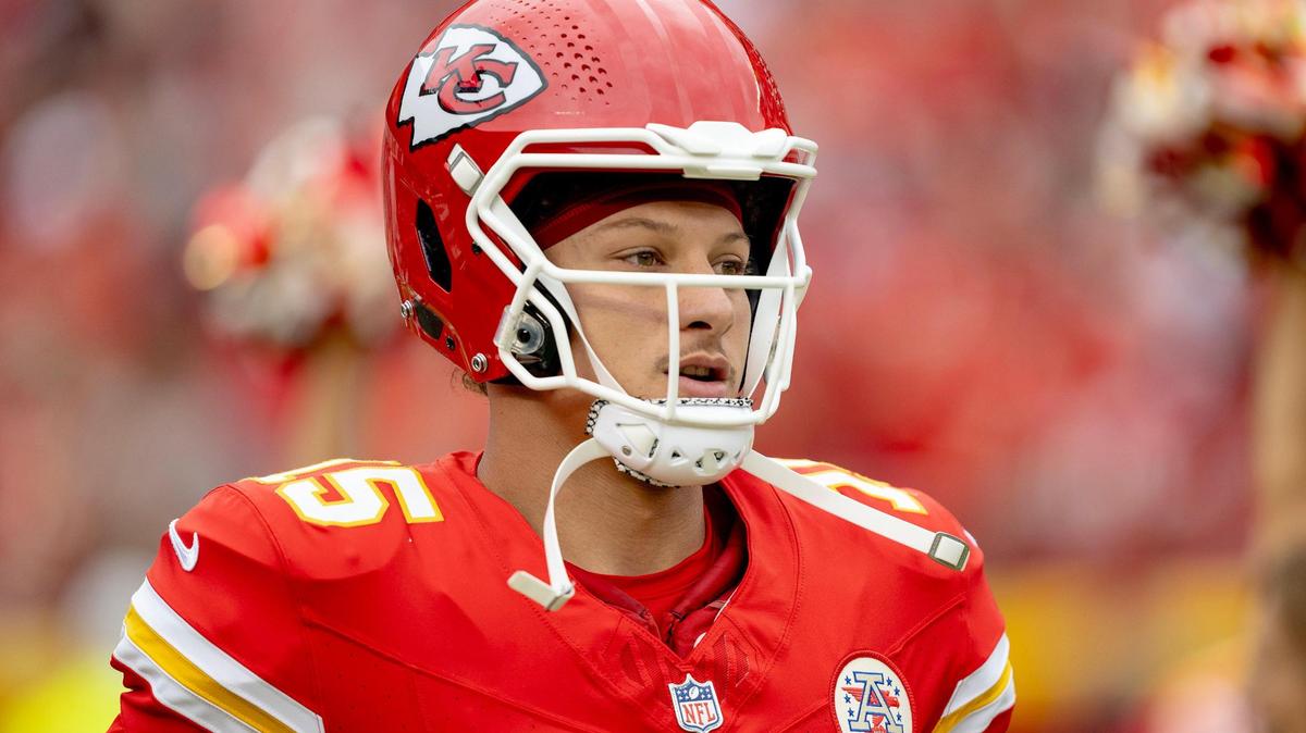 Kansas City Chiefs quarterback Patrick Mahomes (15) runs onto the field before an NFL preseason football game against the Cleveland Browns on Saturday, Aug. 26, 2023, in Kansas City.