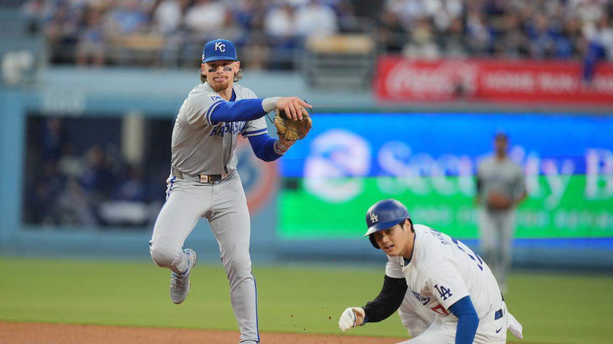 Kansas City Royals shortstop Bobby Witt Jr. (7) forces out Los Angeles Dodgers designated hitter Shohei Ohtani (17) at second base in the third inning at Dodger Stadium on June 14, 2024.