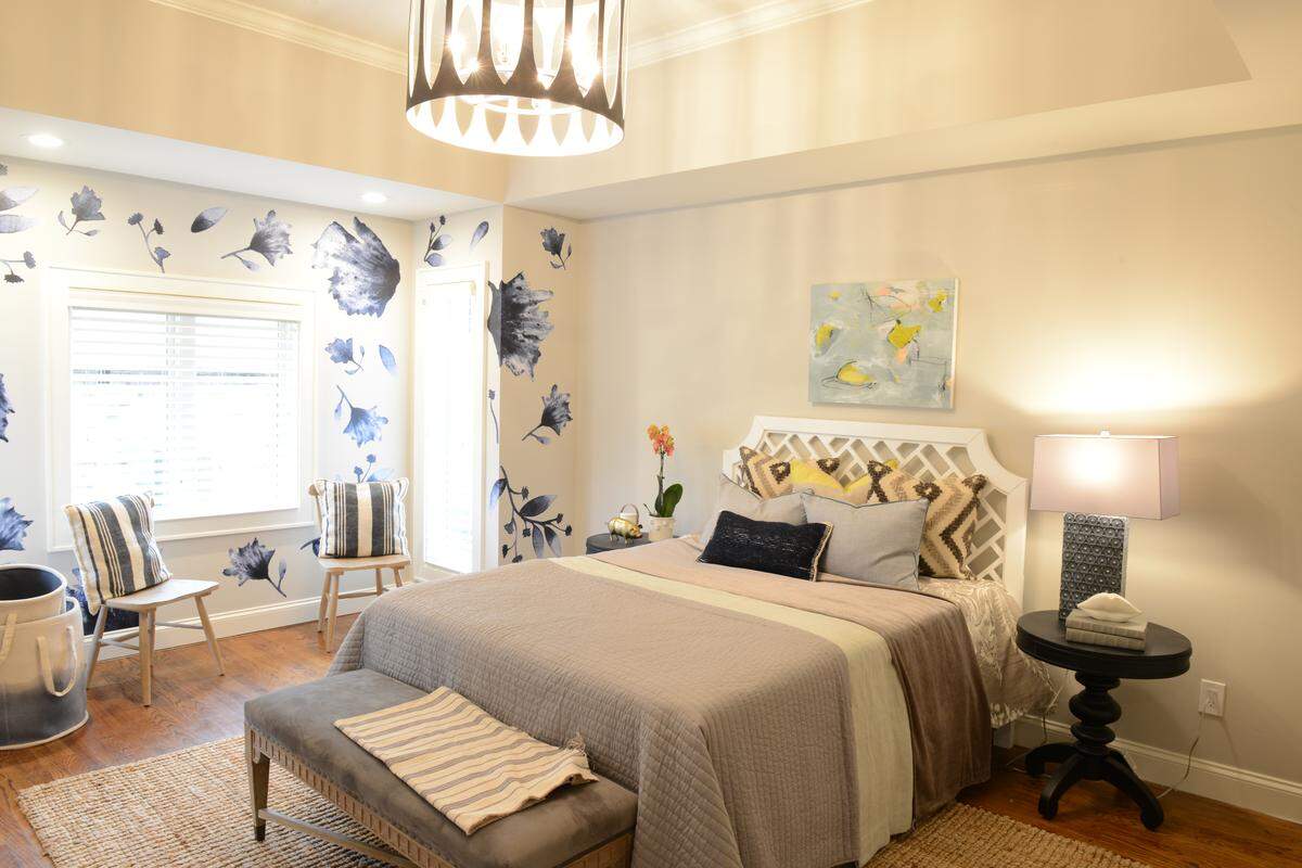 The master bedroom of a house renovated by Tamara Day for DIY Network's "Bargain Mansions."