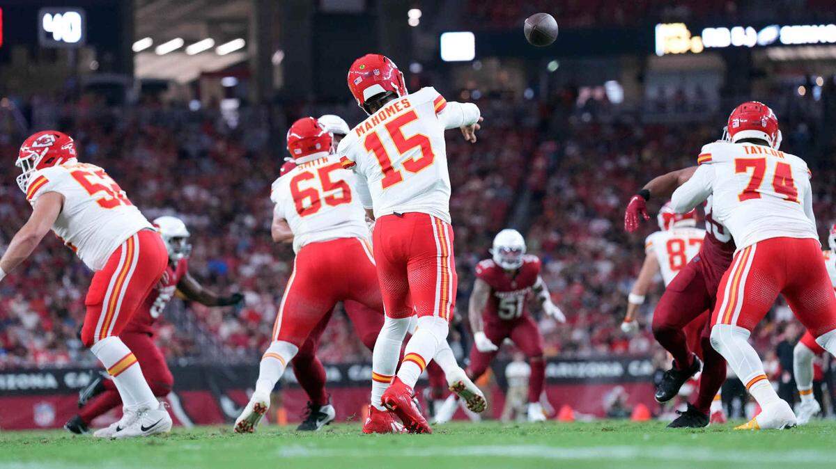 Kansas City Chiefs quarterback Patrick Mahomes (15) passes the ball against the Arizona Cardinals during the first half of a preseason game at State Farm Stadium on Aug. 19, 2023.