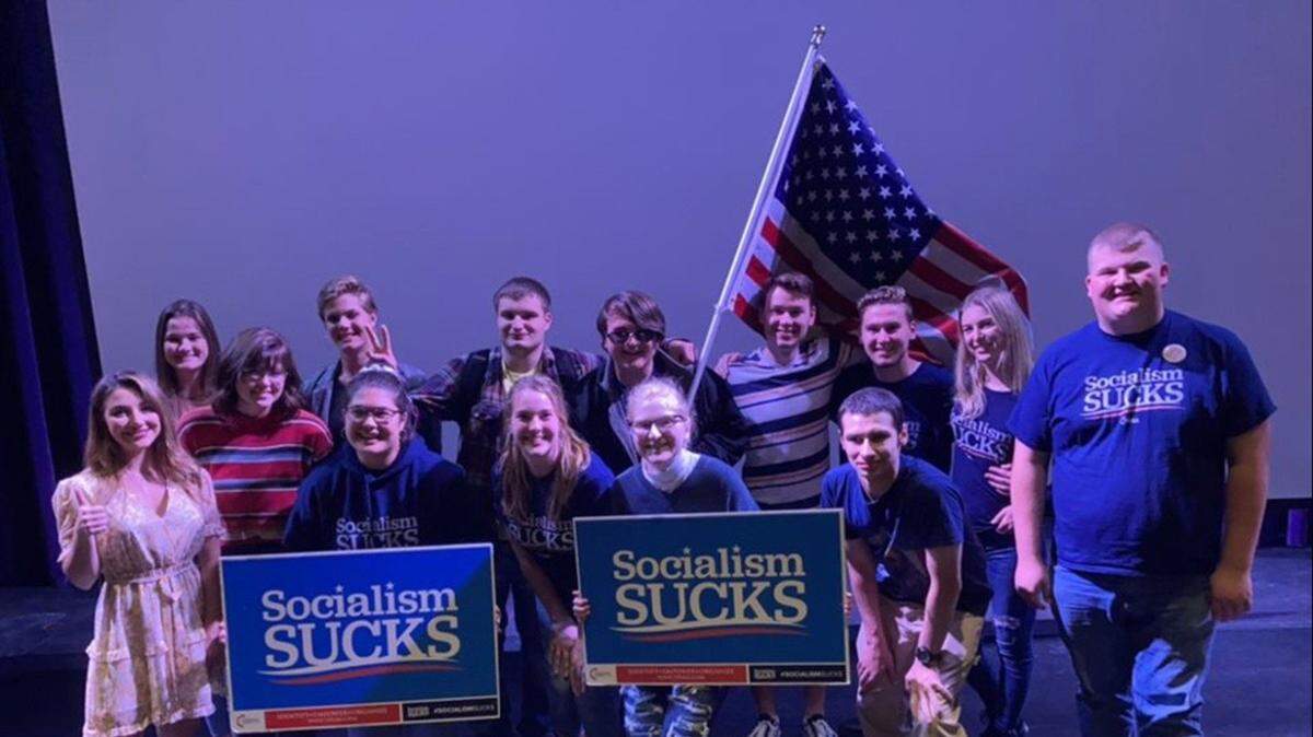 A group photo from the Turning Point USA-Wichita State University “Socialism Sucks” event on Oct. 22. Speaker Morgan Zegers is at far left.