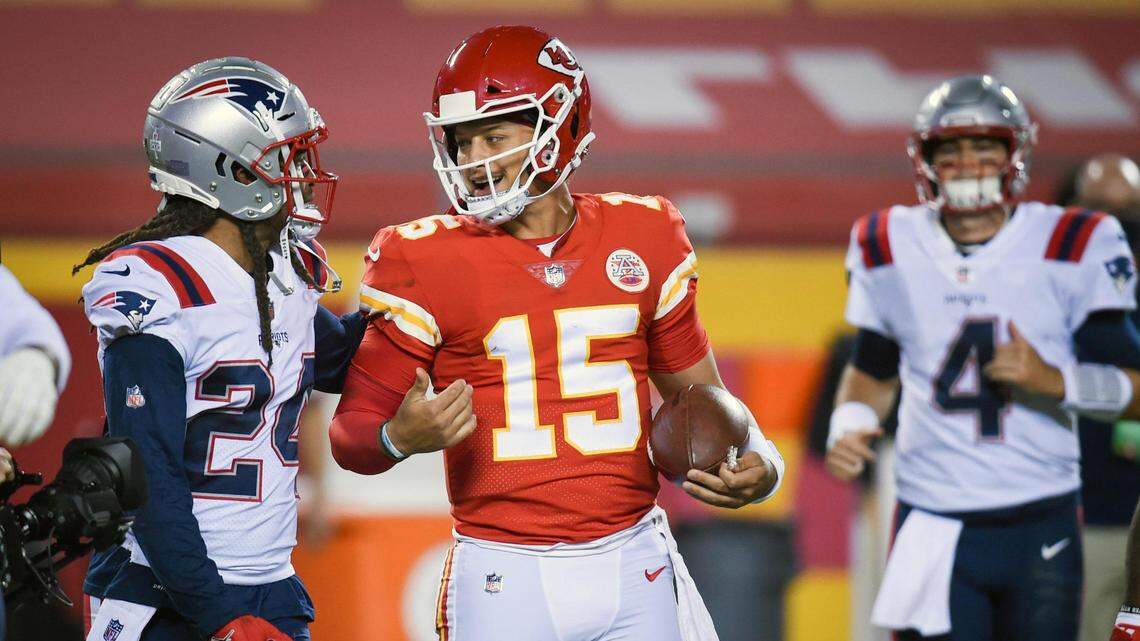 Patriots cornerback Stephon Gilmore (24) greets Chiefs quarterback Patrick Mahomes (15) after Kansas City defeated New England, 26-10, at Arrowhead Stadium on Monday, Oct. 5, 2020, in Kansas City. Media outlets are reporting that Gilmore has tested positive for COVID-19.