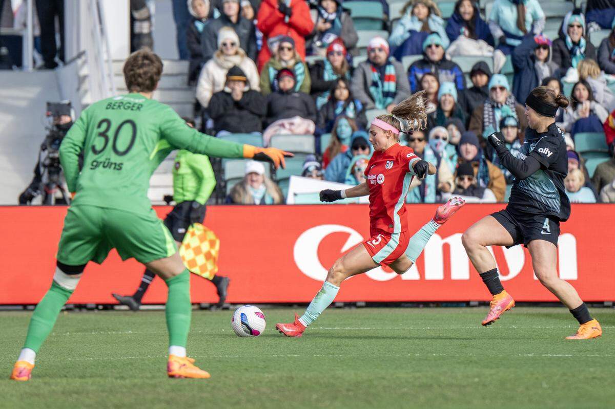 KC Current defender Ellie Wheeler, at center, scores a goal during an NWSL playoff game against Gotham FC at CPKC Stadium in Kansas City on Sunday, Nov. 9, 2025.