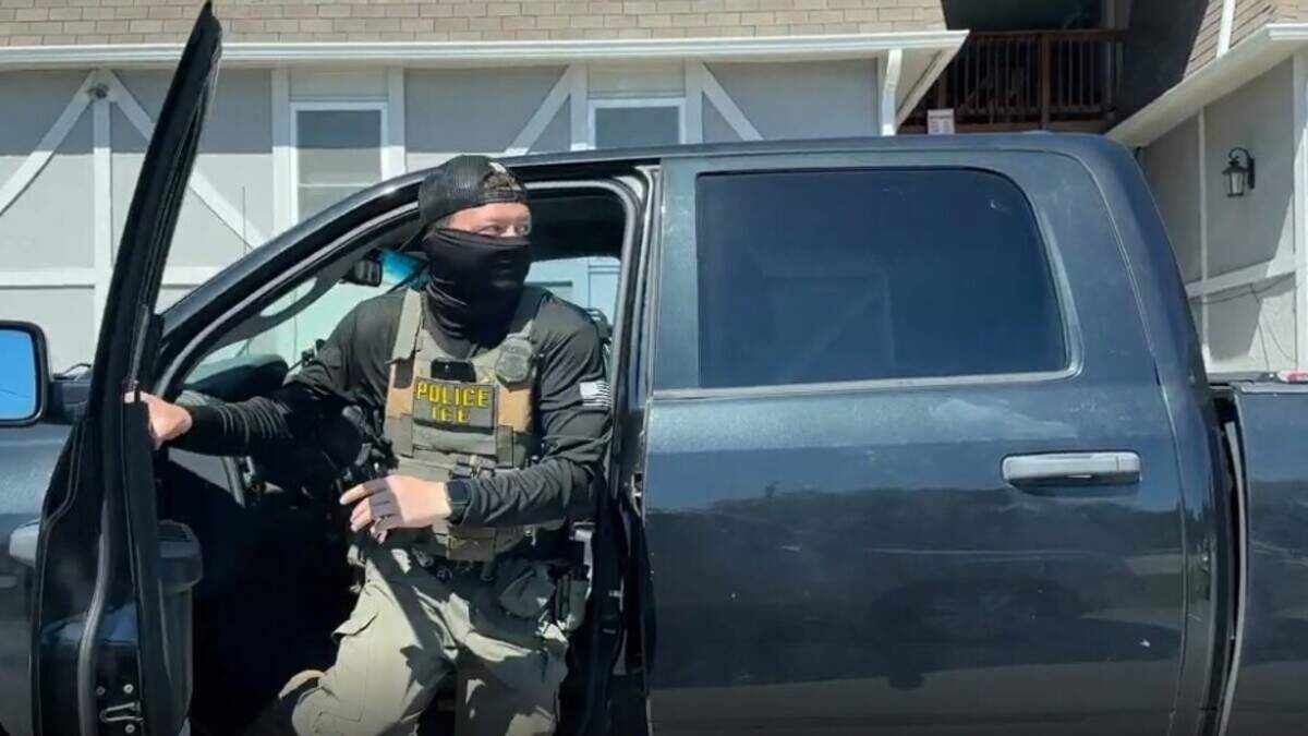 An ICE Officer seen in Olathe in a July 11 operation that was recorded by a bystander.
