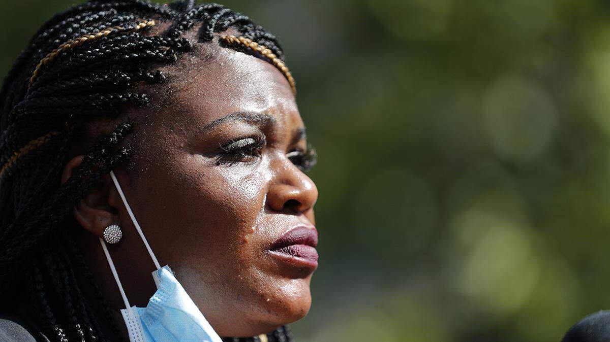Activist Cori Bush speaks during a news conference Wednesday, Aug. 5, 2020, in St. Louis. Bush pulled a political upset on Tuesday, beating incumbent Rep. William Lacy Clay in Missouri’s 1st District Democratic primary. (AP Photo/Jeff Roberson)