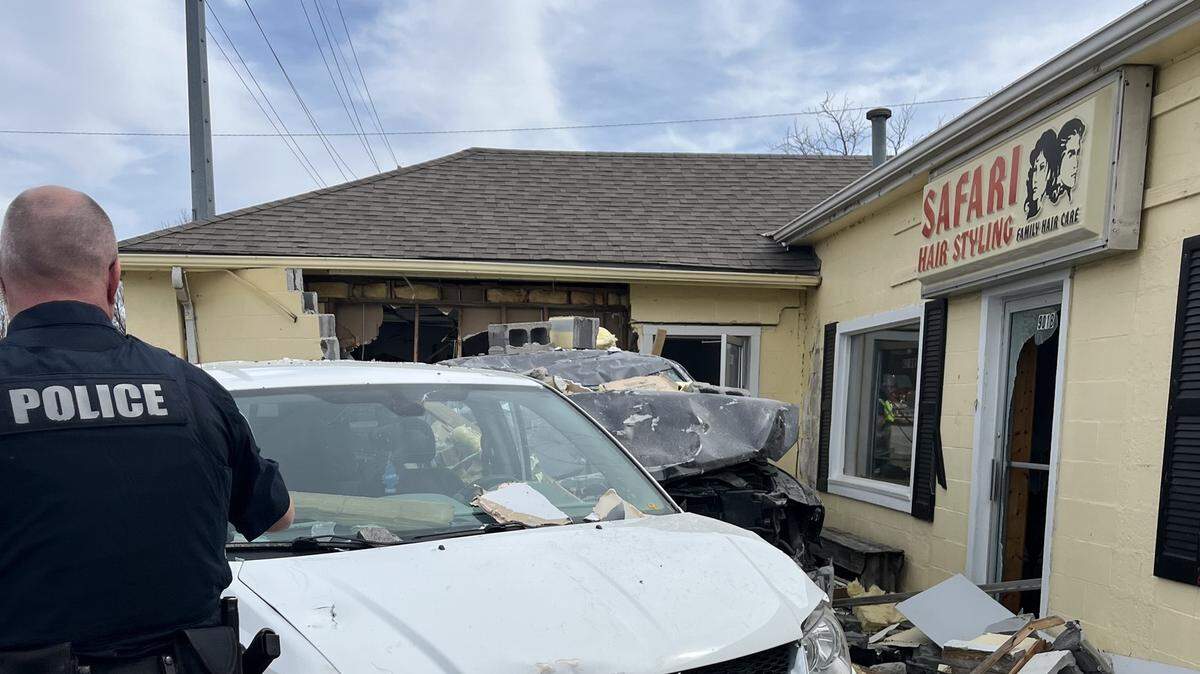 Louisburg police said two people who were inside an office space in a salon in the 900 block of West Amity Street were injured when a vehicle crashed through the building Tuesday.