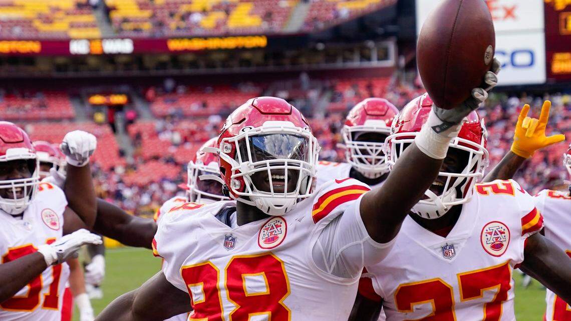 Kansas City Chiefs defensive end Tershawn Wharton holds up the football after securing an interception against the Washington Football Team Sunday afternoon in Landover, Md.