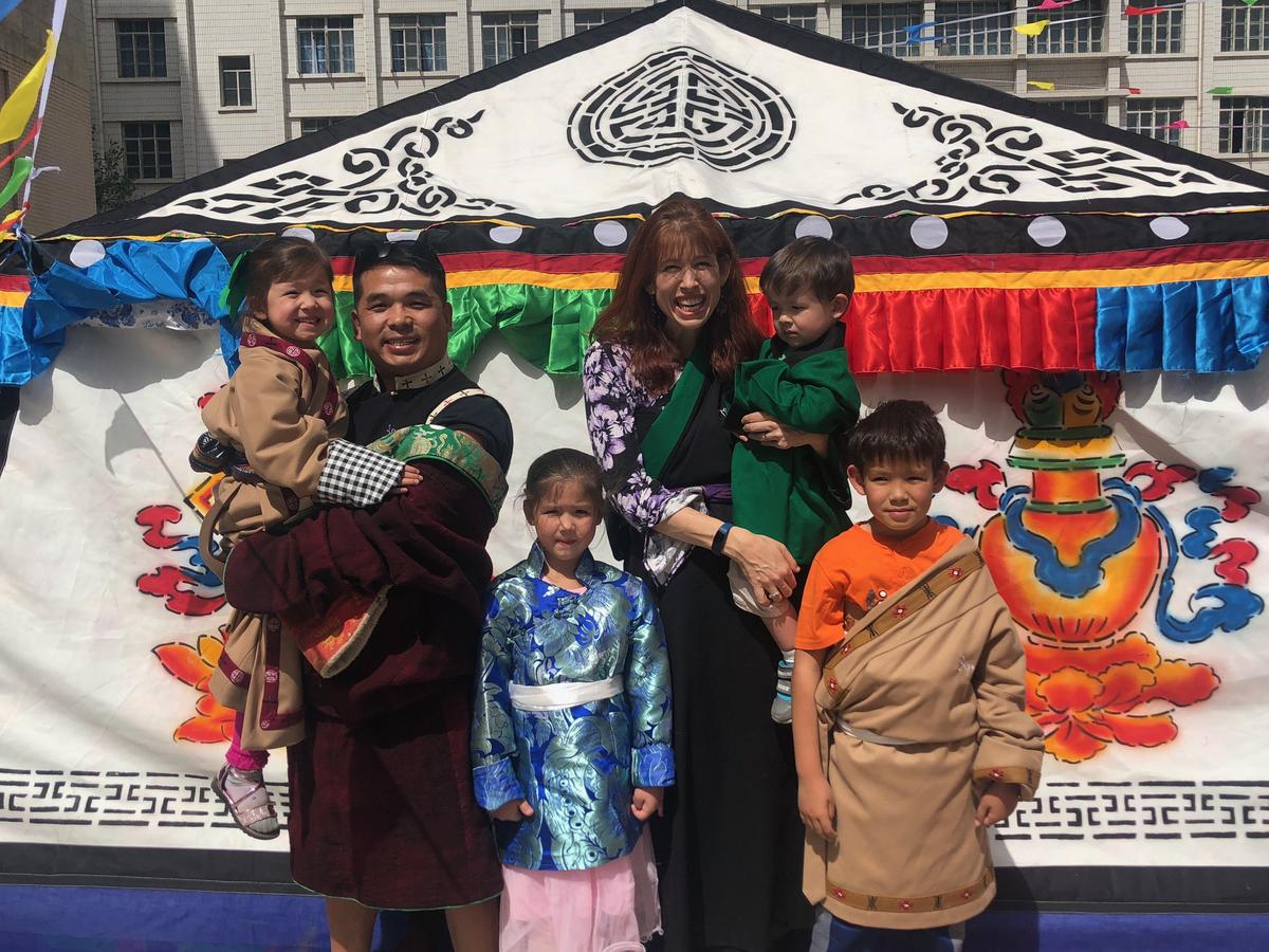 Xindong Hao lived with his wife, Laura Hao, and four children, ages 2 to 8, in China. They were visiting Kansas City when he was fatally shot Wednesday evening.
