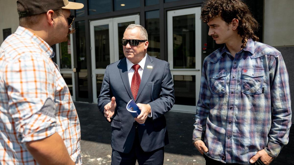 Warren Fairley, a former Boilermakers international president, spoke with union members outside the Robert J. Dole Federal Courthouse in Kansas City, Kansas, in June 2023. He pleaded guilty on March 16, 2026, to racketeering conspiracy and embezzlement from a labor organization in a federal union corruption case.