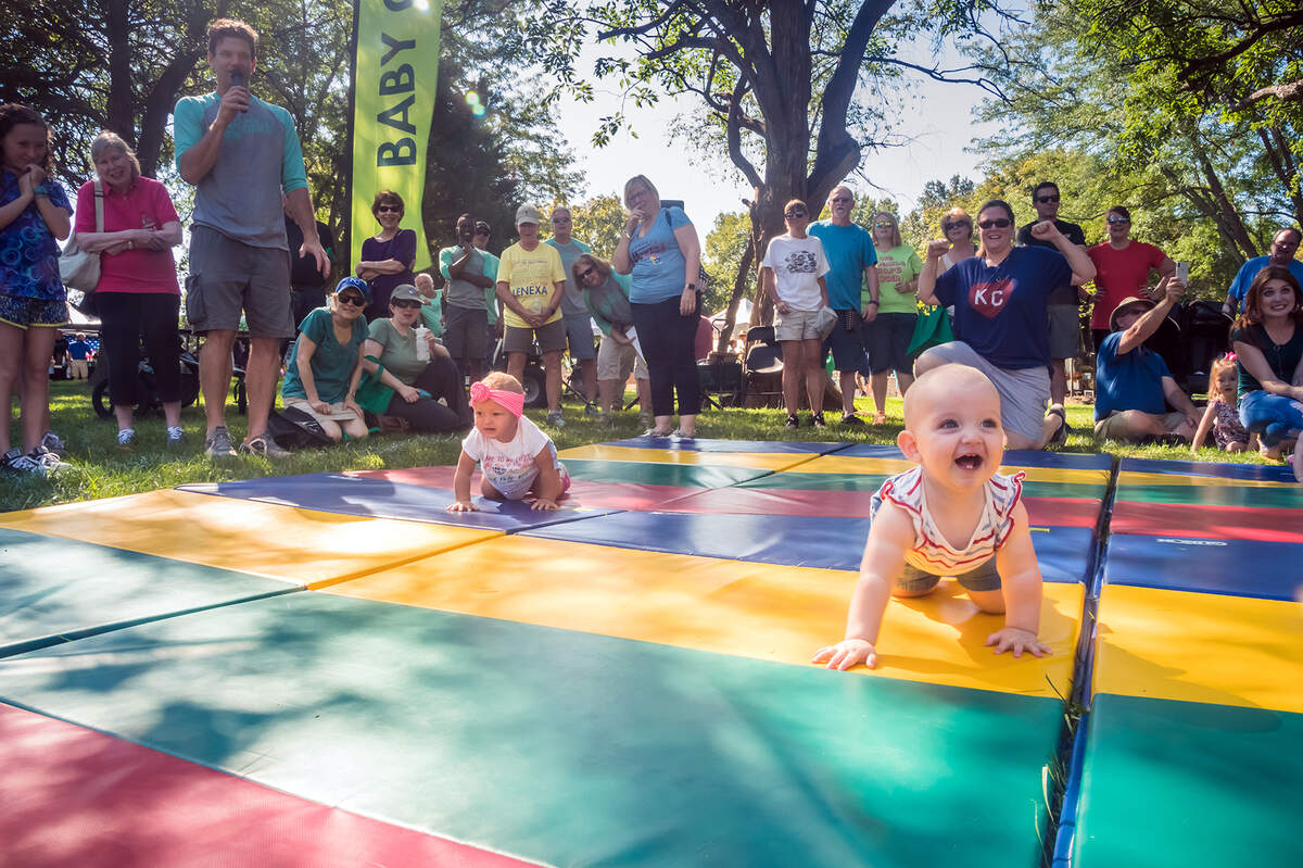 The Swee’Pea Baby Crawling Contest is a favorite at the Lenexa Spinach Festival.