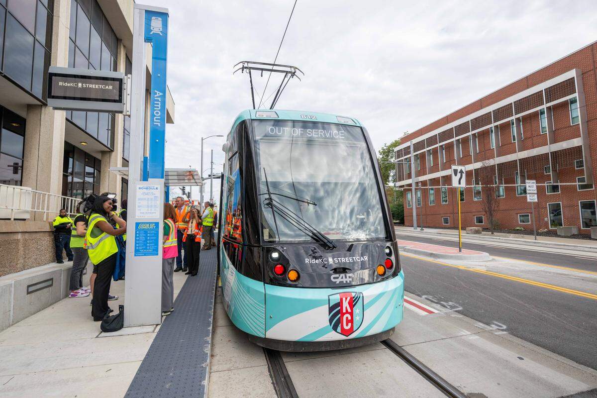 A group of journalists makes a stop at the Armour Road stop along the KC Streetcar route during a preview ride of the Main Street extension, on Wednesday, Oct. 15, 2025, in Kansas City. The Main Street extension is undergoing finishing touches and will open to the public on October 24.