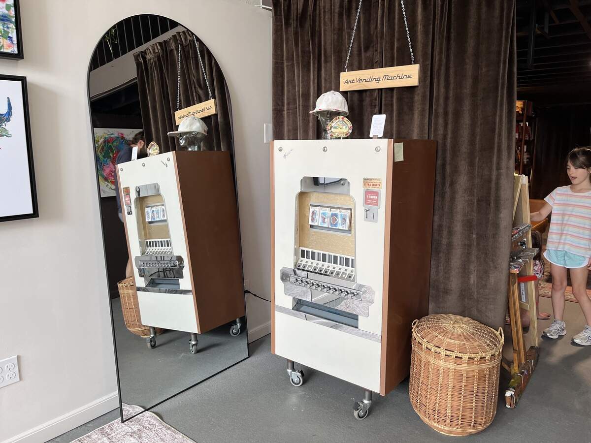The refurbished vending machine inside Megh Knappenberger’s gallery and shop where customers can buy a mini print of one of four iconic Kansas City landmarks.