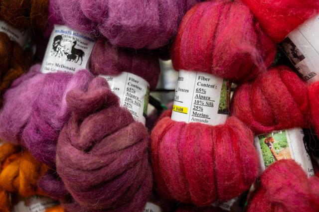 Lorry McDonald of Oak Grove, Missouri, had alpaca wool yarn for sale at her booth, Black Water Treasures, Friday at the MOPACA Invitational Alpaca Show 2024 at Hale Arena. McDonald is a master spinner and spins and dyes the alpaca fiber.