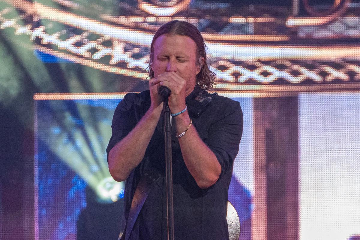 Dierks Bentley performs the song “Lot of Leavin’ Left to Do” Friday during his concert at T-Mobile Center.