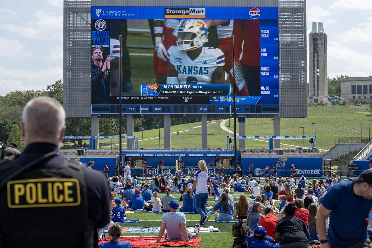 Fans of the Kansas Jayhawks gathered at the new David Booth Kansas Memorial Stadium in Lawrence to watch the Border War showdown between the Jayhawks and the Missouri Tigers in Columbia on Saturday, September 6, 2025.