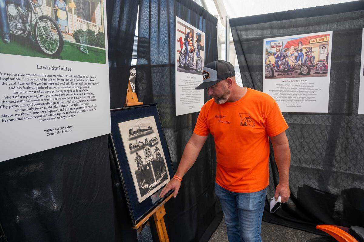 Eric Schlossenberg, a member of the KC Weasels, shows off their tent at The David Mann Chopper Fest in Kansas City. Mann was a member and founder of the Weasels in California and started the group’s first charter in Kansas City.