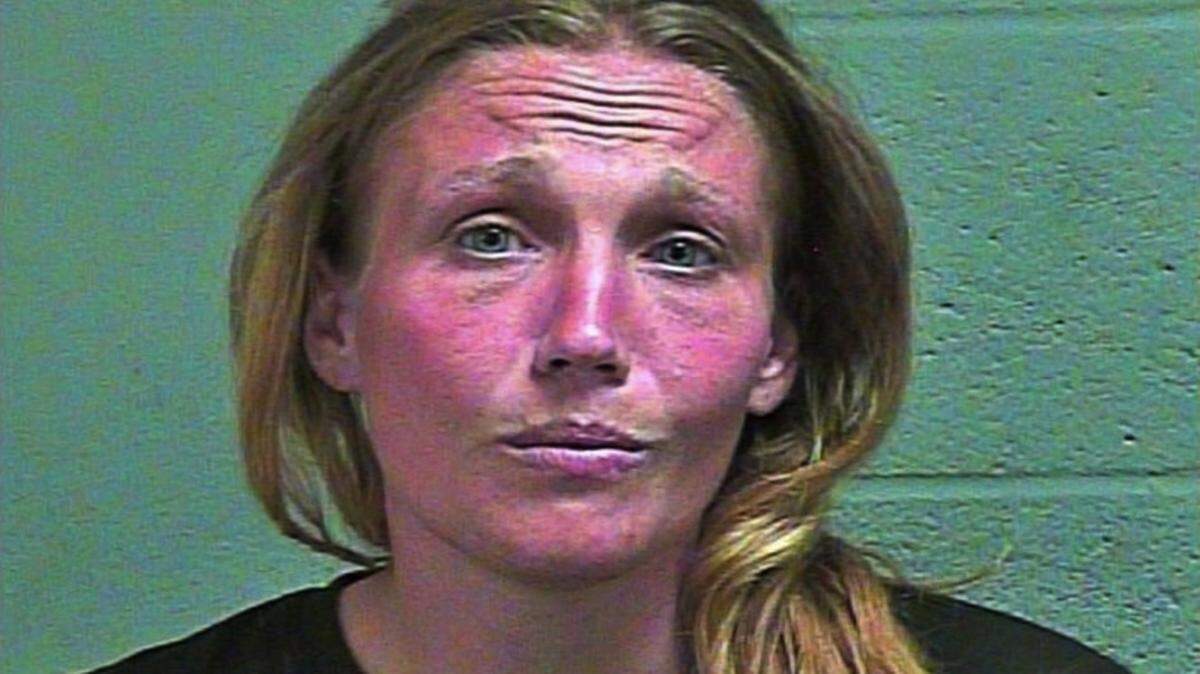 Roselina Elizabeth Starr, 32, was booked into Oklahoma County jail on Sunday, accused of throwing a rock that fatally wounded 61-year-old Gary Evans of Oklahoma City.