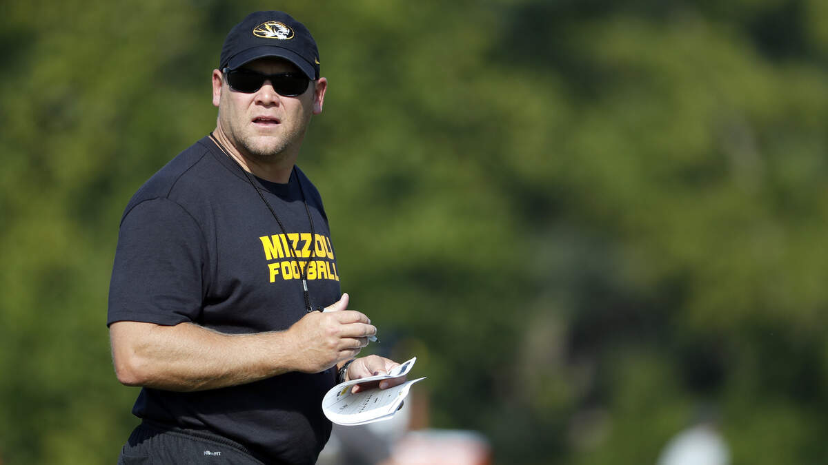 Missouri head coach Barry Odom watches his team during an NCAA college football practice Friday, Aug. 3, 2018, in Columbia, Mo.