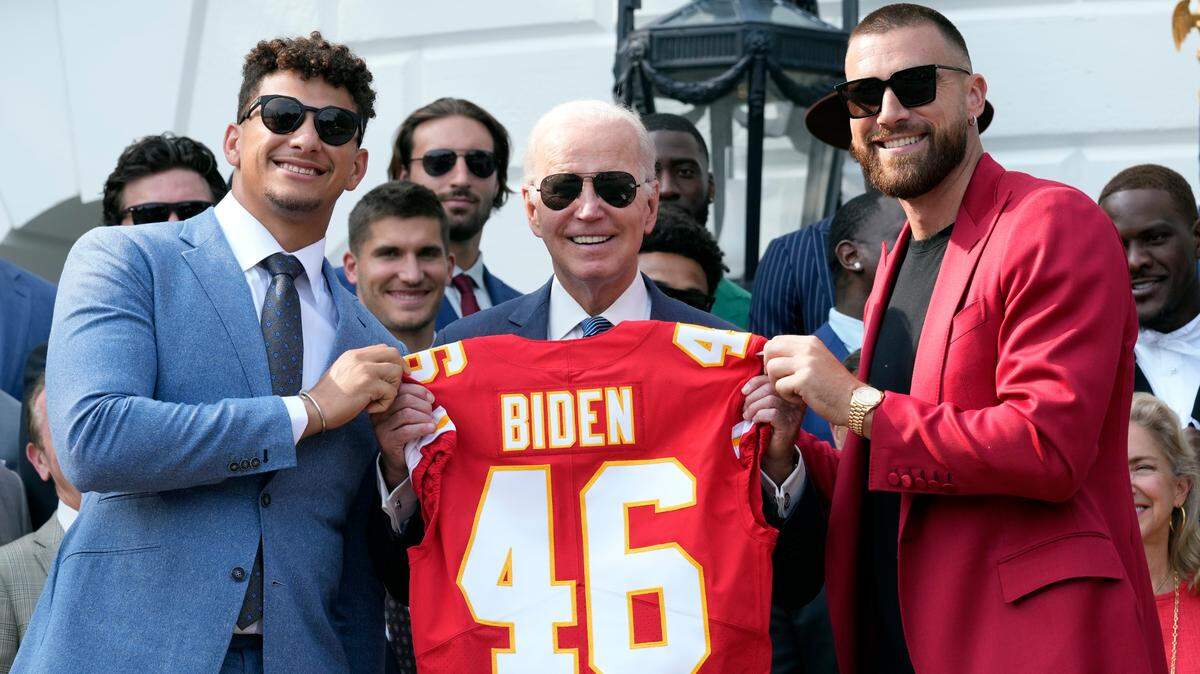Kansas City Chiefs quarterback Patrick Mahomes and Kansas City Chiefs tight end Travis Kelce present President Joe Biden with a jersey as he welcomed the Kansas City Chiefs football team to the White House in Washington, Monday, June 5, 2023, to celebrate their championship season and victory in Super Bowl LVII.