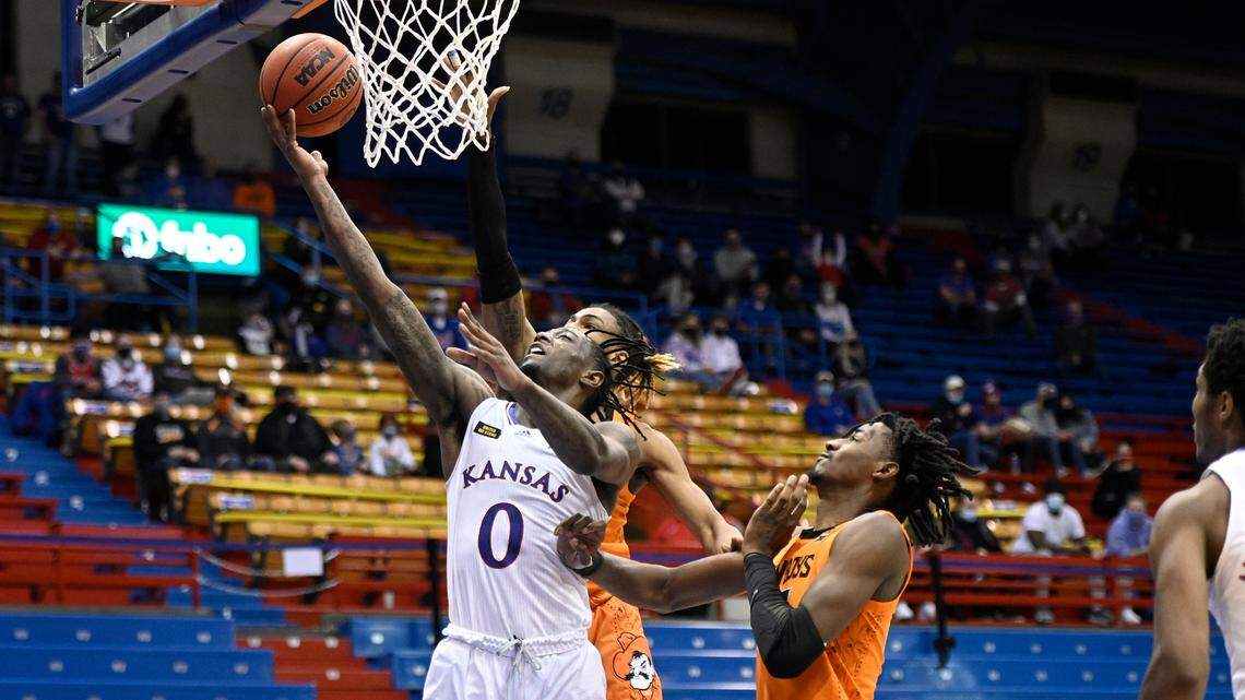 Marcus Garrett went up for two of his 17 points in the Kansas Jayhawks’ home victory over Oklahoma State on Feb. 8, 2021 at Allen Fieldhouse in Lawrence.