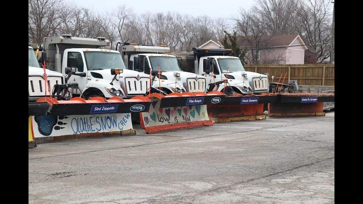 15 community-named snow plows ranging from Tyreek Chill to Luke Snowalkers lined up in a lot on Jan. 14, 2022