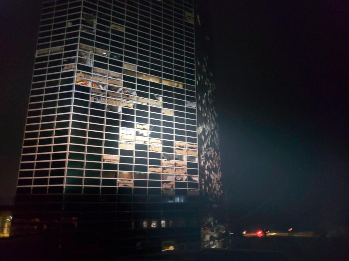 A building that was damaged overnight by Hurricane Laura stands in Lake Charles, La., Thursday, Aug. 27, 2020. (Stephen Jones via AP)