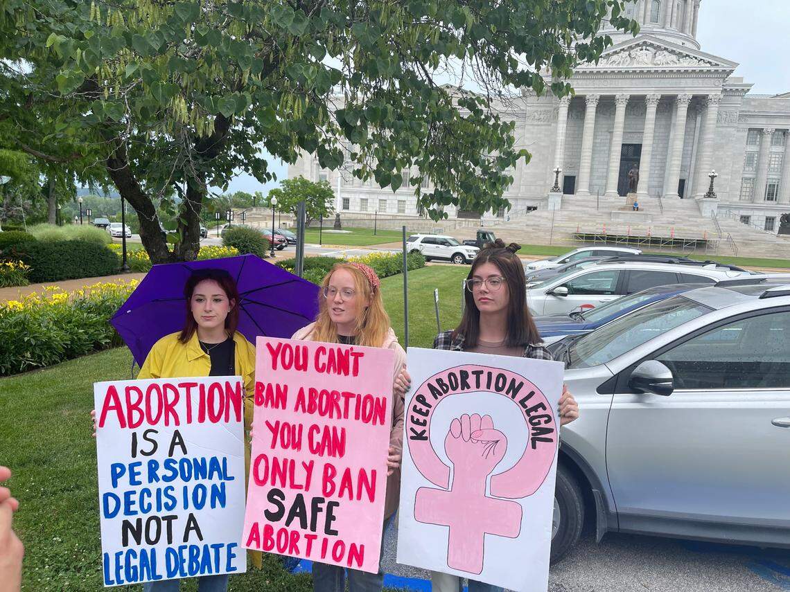 Columbia College students Karalynn Fisher, Kaitlin Garrett and Melissa Rogge protest in Jefferson City after the U.S. Supreme Court struck down the right to abortion on Friday.