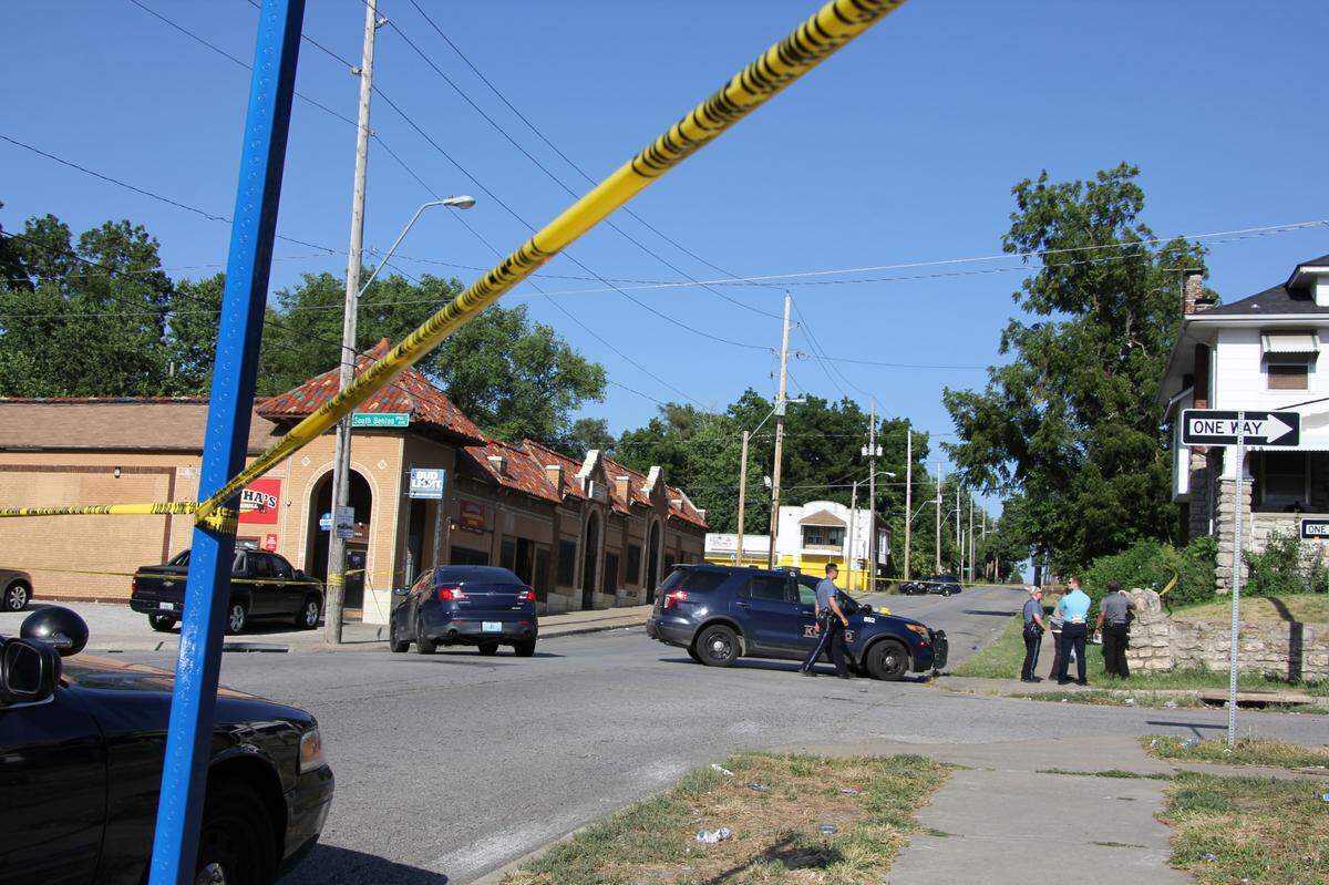 Kansas City police respond to a homicide on July 23, 2022, at East 39th Street and South Benton Avenue. Officers found a man lying hear the sidewalk who had been shot.