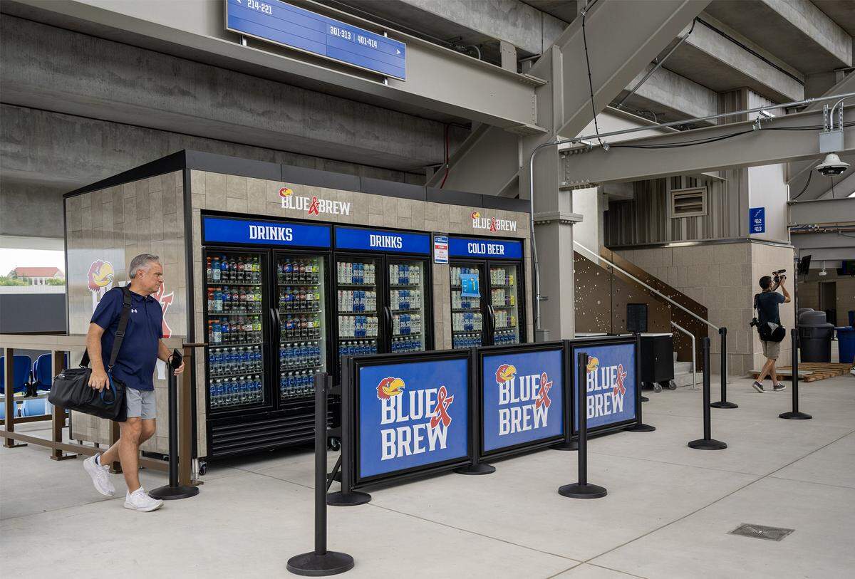The Blue & Brew drink stand in the concourse seen during a tour showing off the $450 million in renovations at David Booth Kansas Memorial Stadium on Tuesday, Aug. 19, 2025, at the University of Kansas in Lawrence.  
