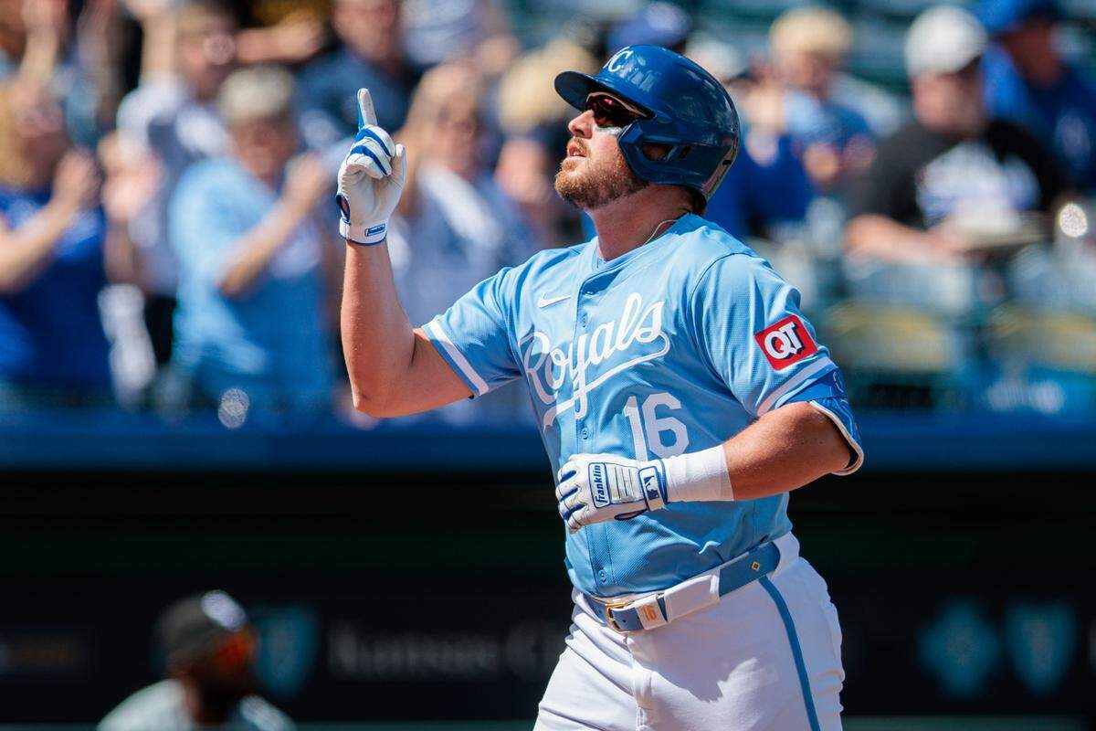 Kansas City Royals outfielder Hunter Renfroe crosses home plate after hitting a home run during the fifth inning of Sunday’s game against the Chicago White Sox at Kauffman Stadium.