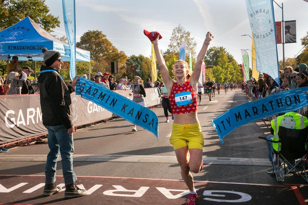 Mary Katherine Andrews crossed the finish line as the women’s winner of the 2024 Garmin Kansas City Marathon on Saturday, October 19, 2024. An estimated 8,000 participated on the course that began and ended in front of The Nelson-Atkins Museum of Art.