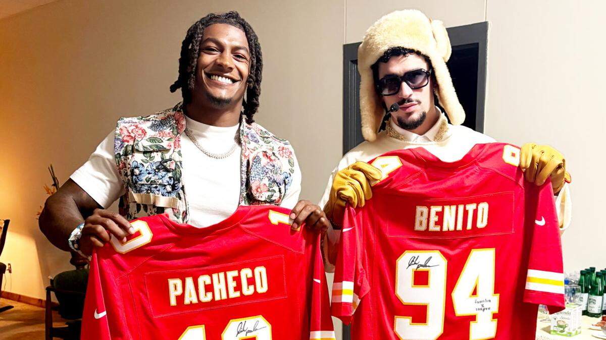 Kansas City Chiefs running back Isiah Pacheco, left, exchanged Chiefs jerseys with rapper/entertainer Bad Bunny after a recent concert in Puerto Rico.