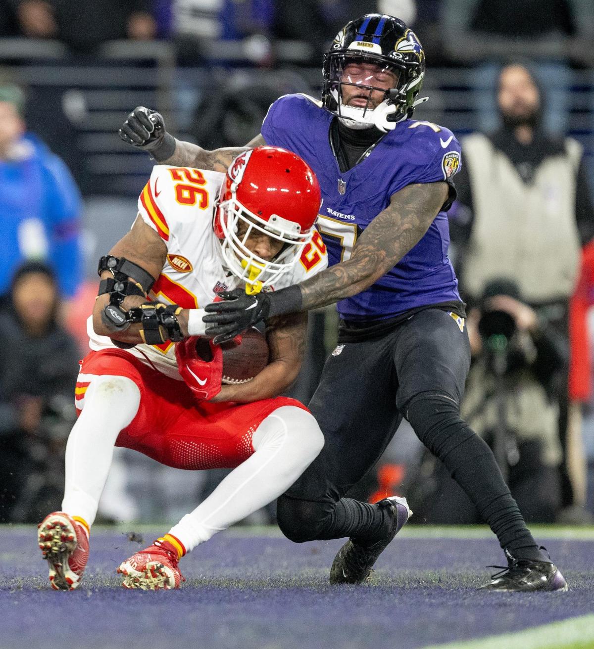 Kansas City Chiefs safety Deon Bush (26) intercepts a pass in the end zone against the Baltimore Ravens during the AFC Championship Game on Sunday, Jan. 28, 2024, in Baltimore.