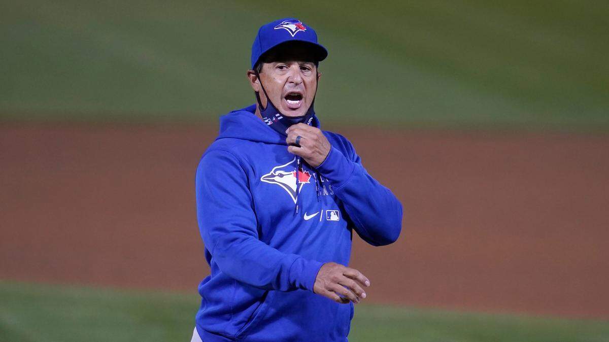 Toronto Blue Jays manager Charlie Montoyo walks toward the dugout after making a pitching change during the seventh inning of his team’s baseball game against the Oakland Athletics in Oakland, Calif., Tuesday, May 4, 2021. (AP Photo/Jeff Chiu)