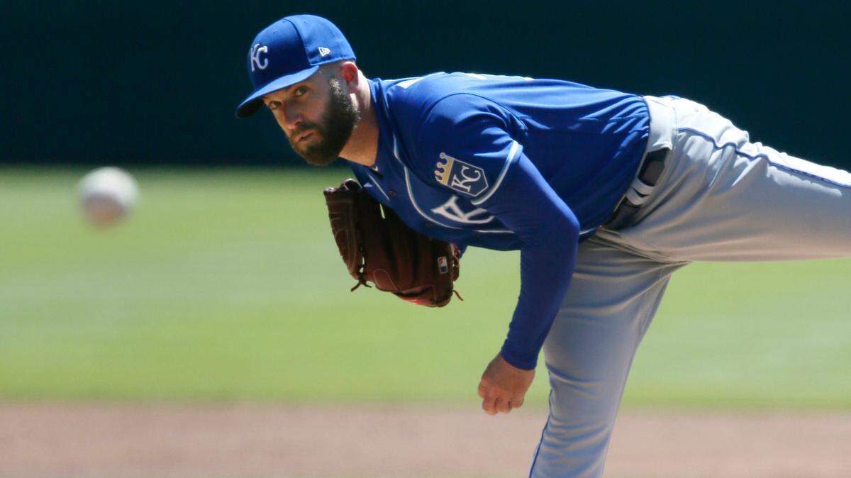 Kansas City Royals’ Danny Duffy pitches against the Detroit Tigers during the first inning of a baseball game Sunday, April 25, 2021, in Detroit. (AP Photo/Duane Burleson)