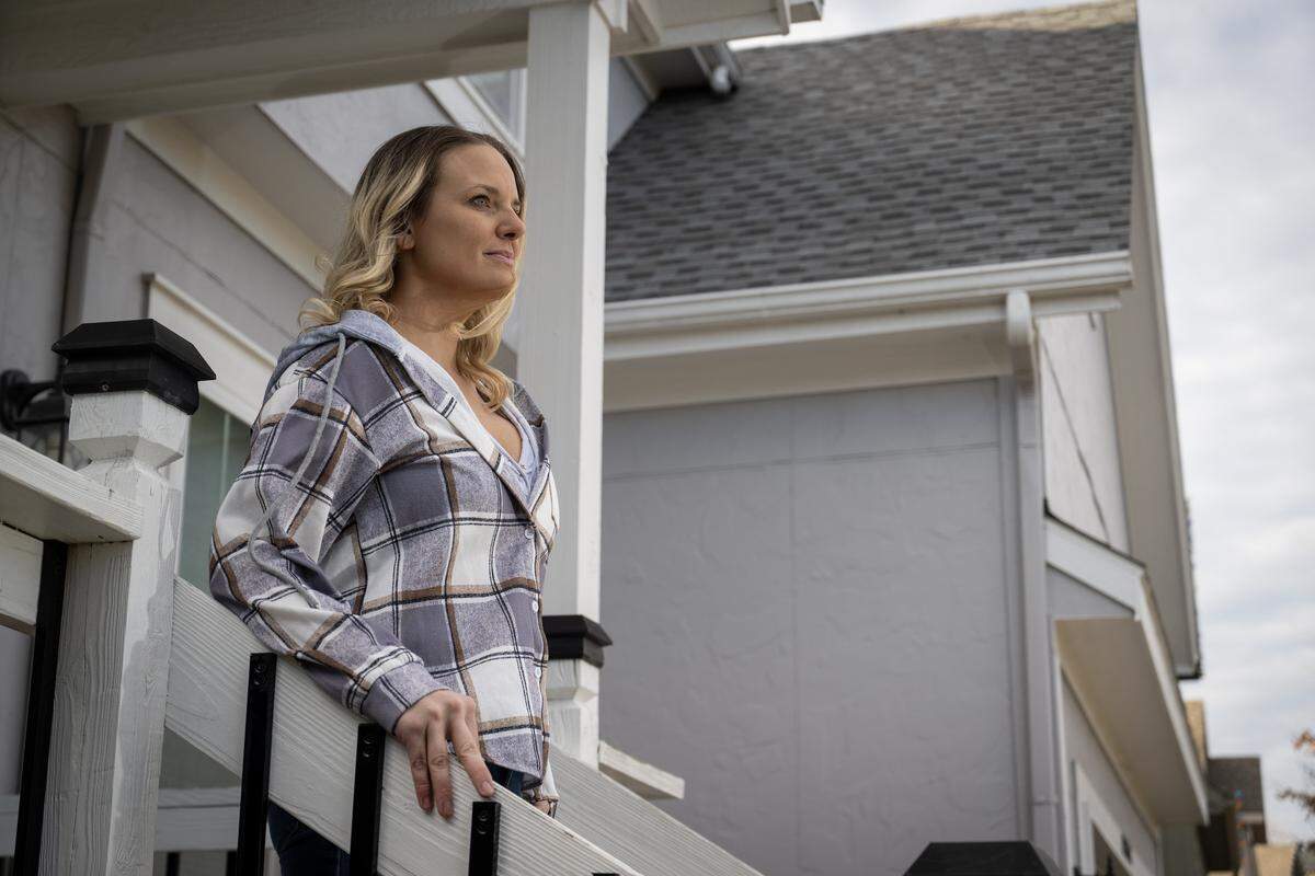 Nichole Cook is concerned about the affordability of homes in her neighborhood in Olathe especially if the Kansas City Chiefs choose to locate the team training facility and headquarters in the city. Cook, who lives with her husband and three children in the Grayson Place subdivision, was photographed on Friday, Jan. 9, 2026. She has seen her property tax rise to nearly $5,700 since they moved in to the house in 2022. 
