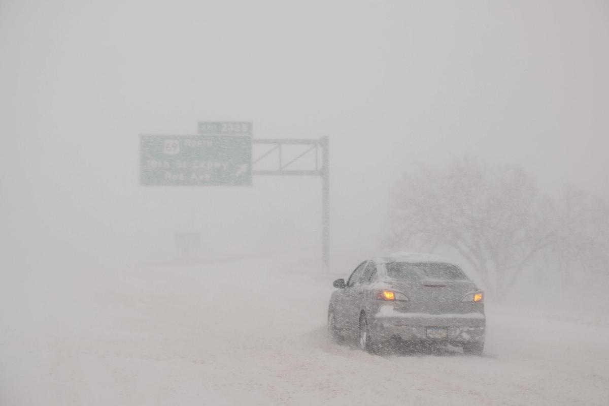 Kansas City experienced whiteout conditions on Sunday, Jan. 5, 2025. Travel routes were heavily impacted with major highways shut down due to ice and snow packed roads.
