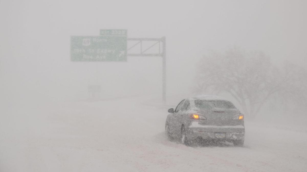 Kansas City experienced whiteout conditions on Sunday, Jan. 5, 2025. Travel routes were heavily impacted with major highways shut down due to ice and snow packed roads.