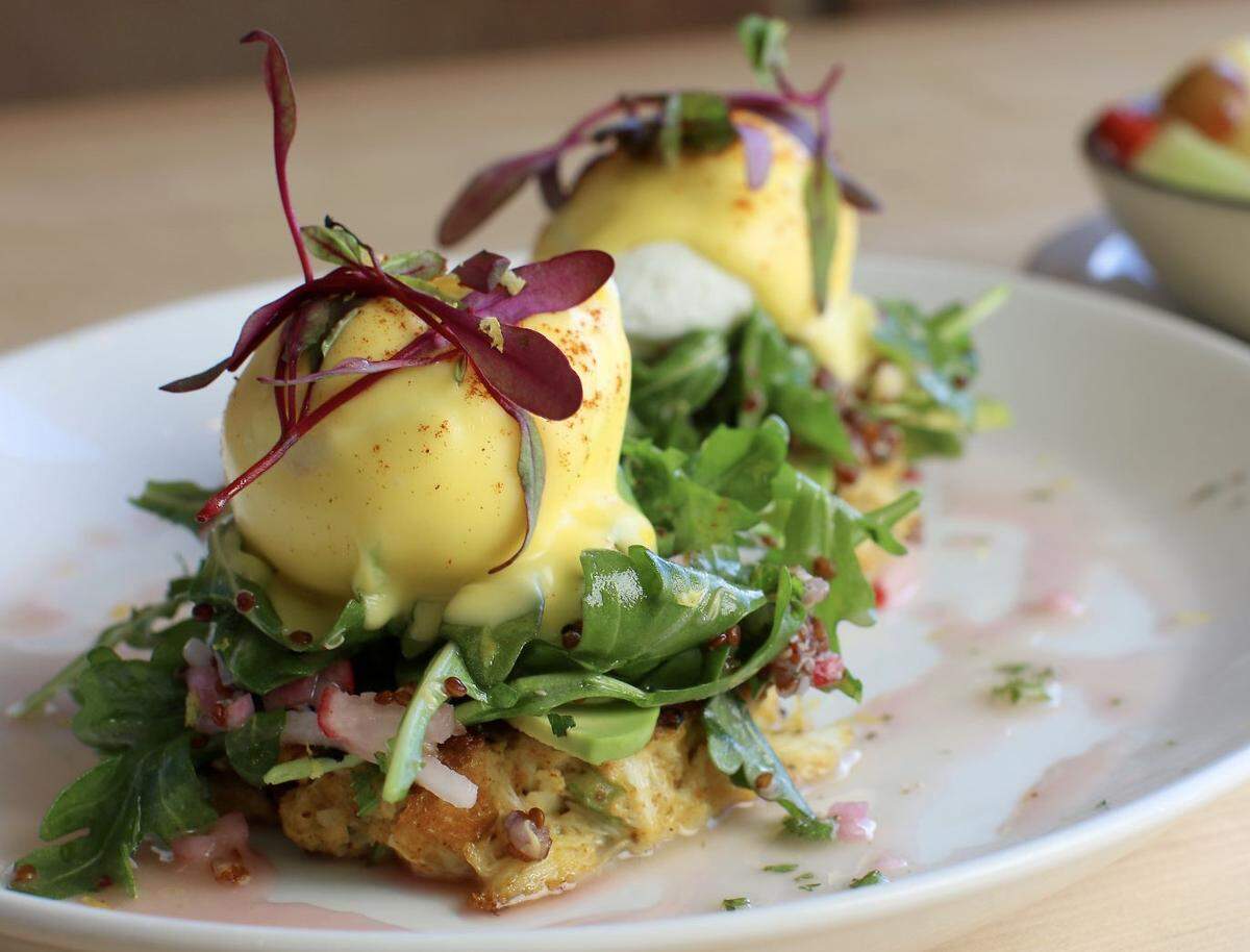 Urban Egg’s jumbo lump crab Benedict with fresh avocado, arugula salad and lemon mignonette dressing.