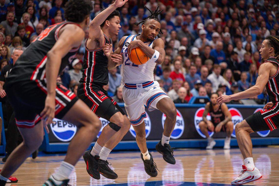 Kansas Jayhawks guard Darryn Peterson (22) drives into the lane during the first half vs. the Houston Cougars on Monday, February 23, 2026, at Allen Fieldhouse.