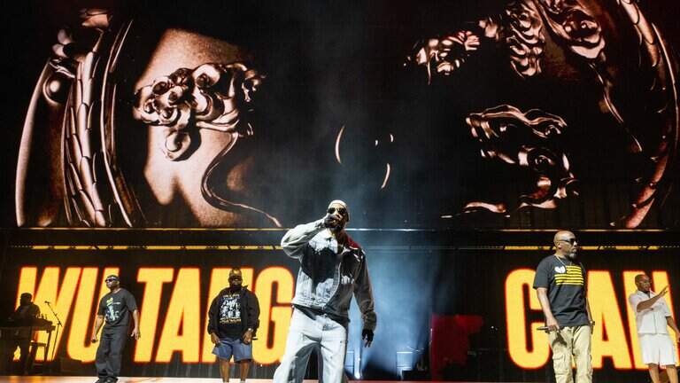Inside the pit with Star photographer at Wu-Tang Clan at Morton Amphitheater