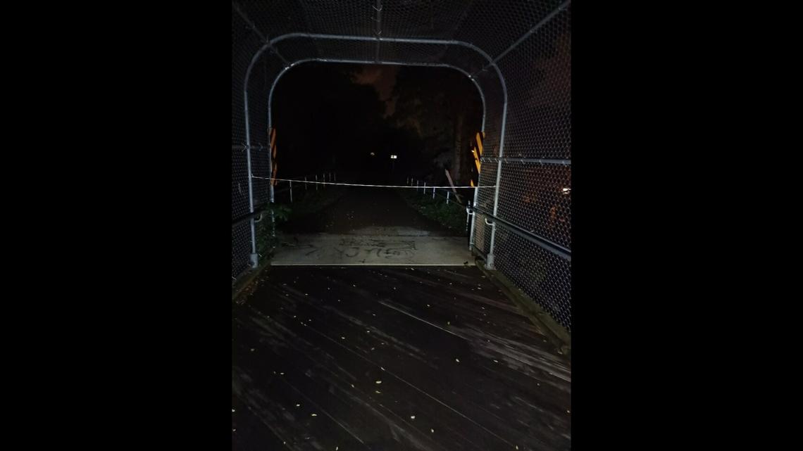 A cyclist crashed after running into a cord that someone apparently tied across a commuter bridge near Madison, Wisconsin. Returning several days later, he found another cord (pictured) tied at the bridge.