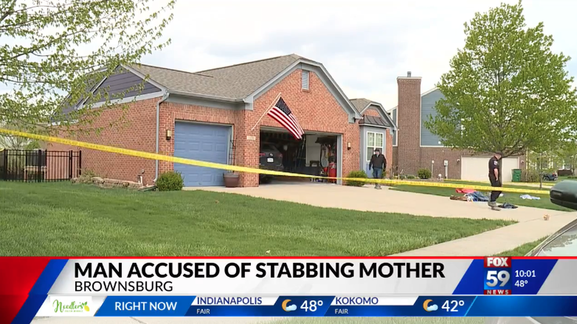Officers in Indiana found a woman with a kitchen knife sticking out of her head after her son stabbed her, police say.