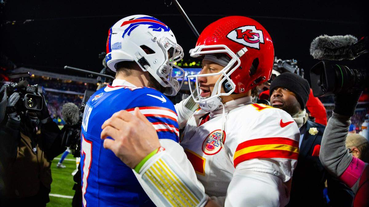 Kansas City Chiefs quarterback Patrick Mahomes (15) greets Buffalo Bills quarterback Josh Allen (17) following the 2024 AFC divisional round game at Highmark Stadium.